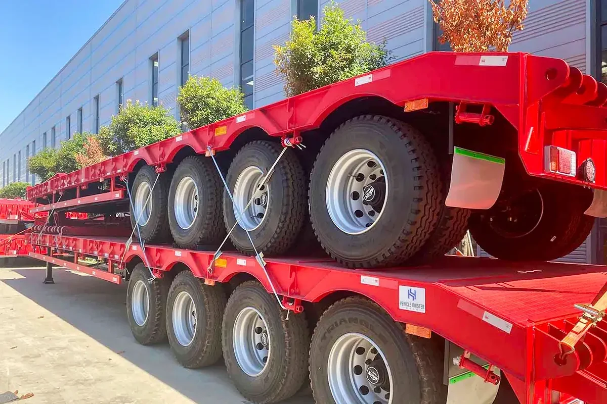4 axle lowbed semi trailer stacked at factory yard for overseas export
