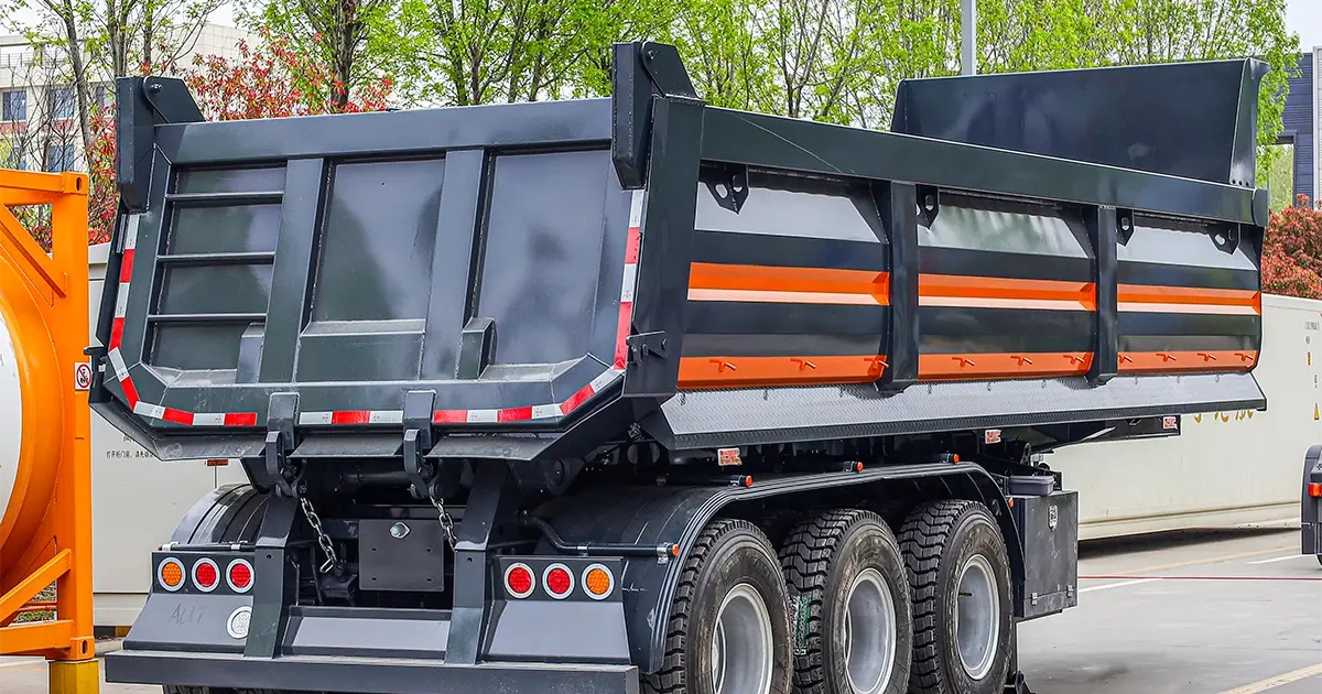 heavy duty tipper truck rear view parked on African road