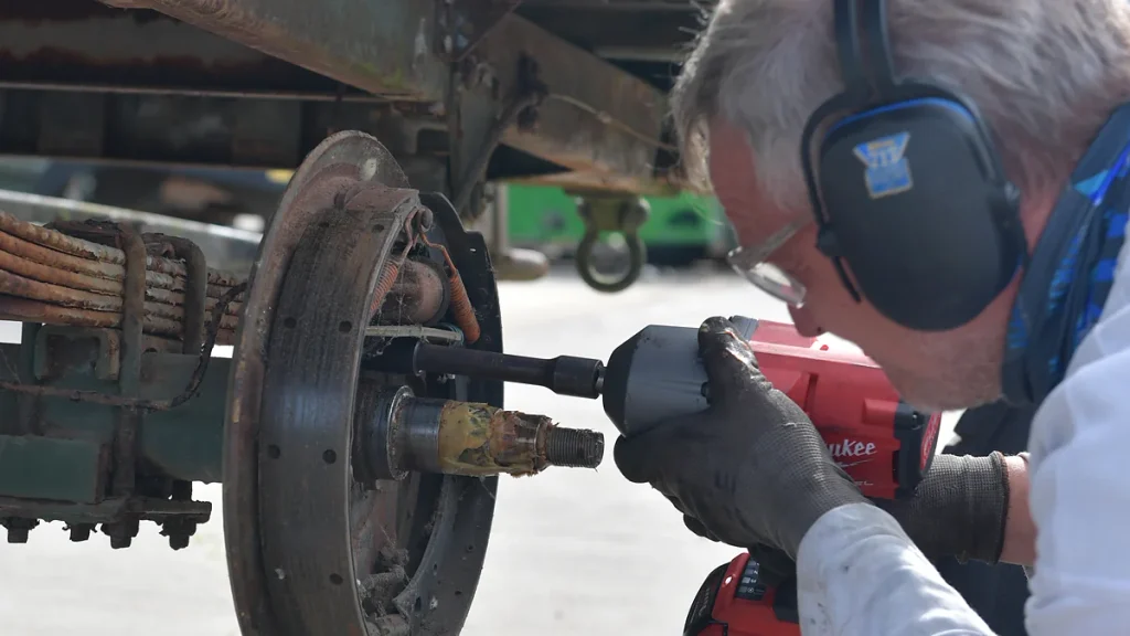 semi-trailer brake system close-up showing brake drum and wheel cylinder